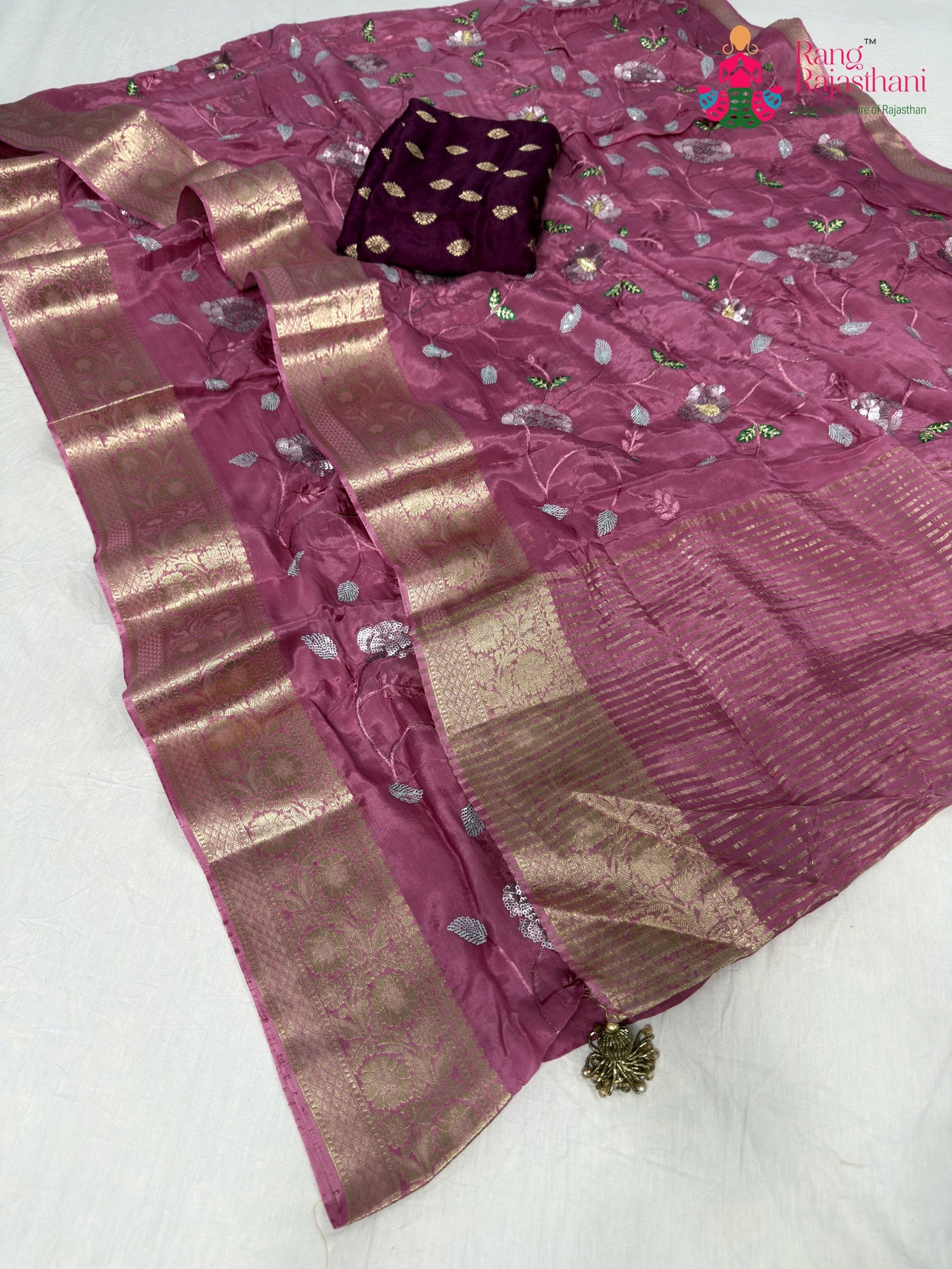 close up detailing of pink chinnon sequin saree