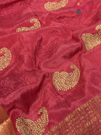 design pattern of pink chinnon zari embroidery saree