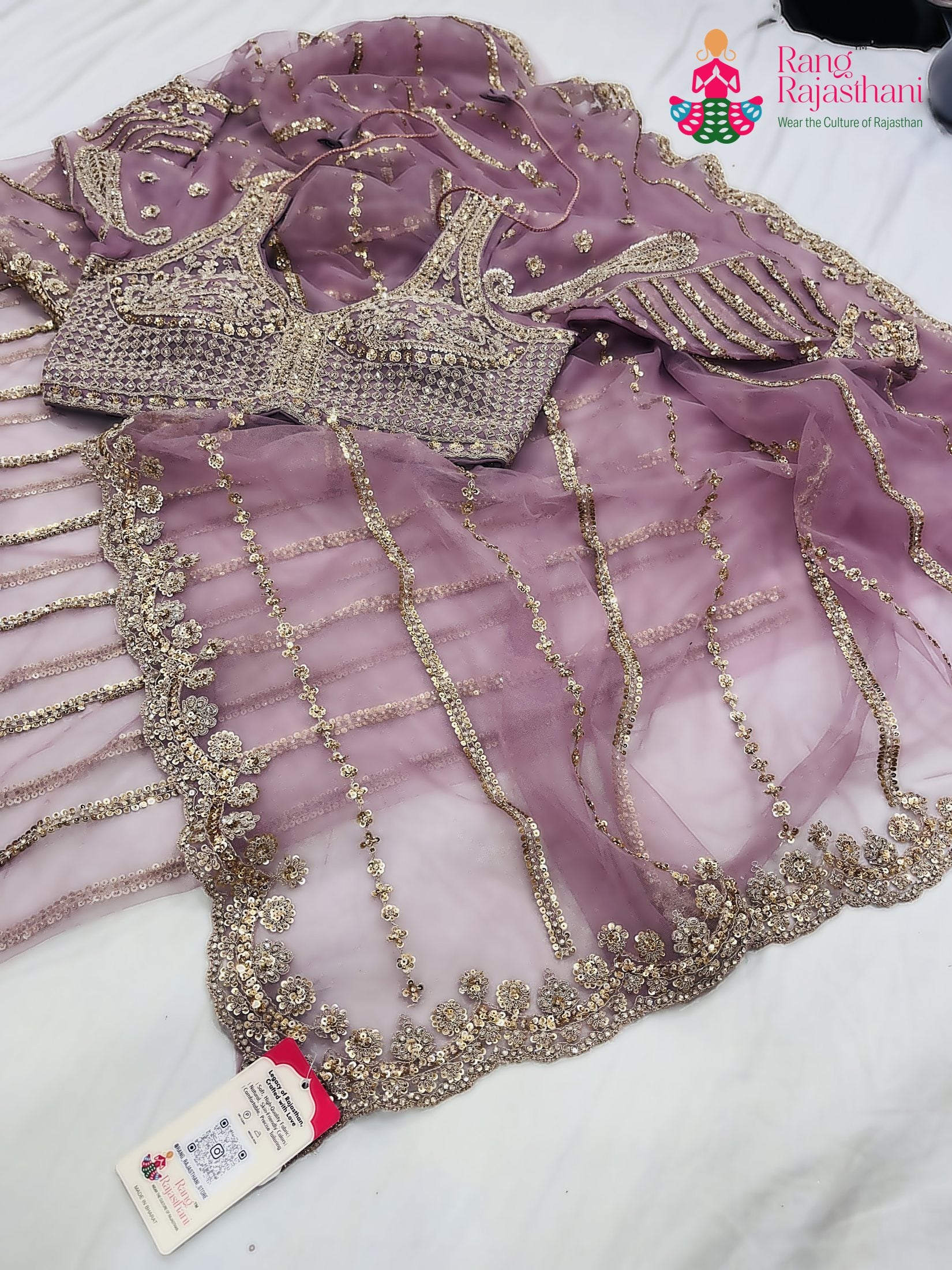 complete look of pink net sequin saree 