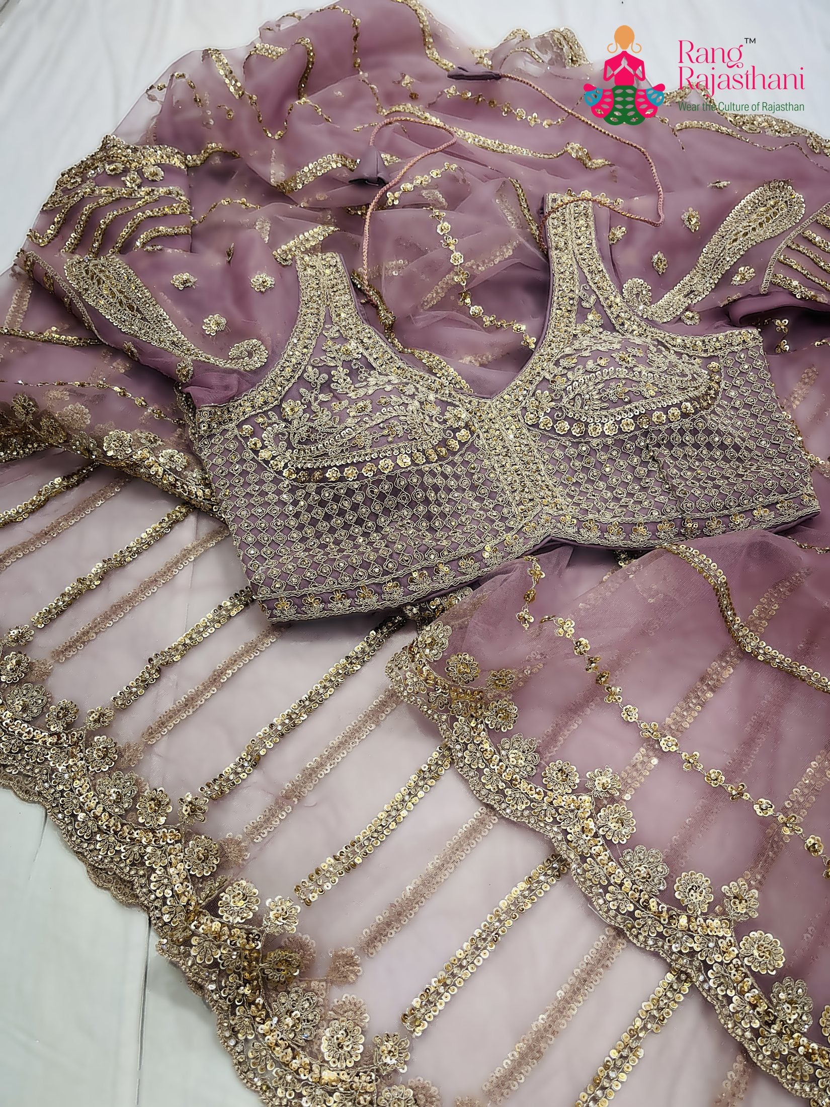 close up detailing of pink net sequin saree 