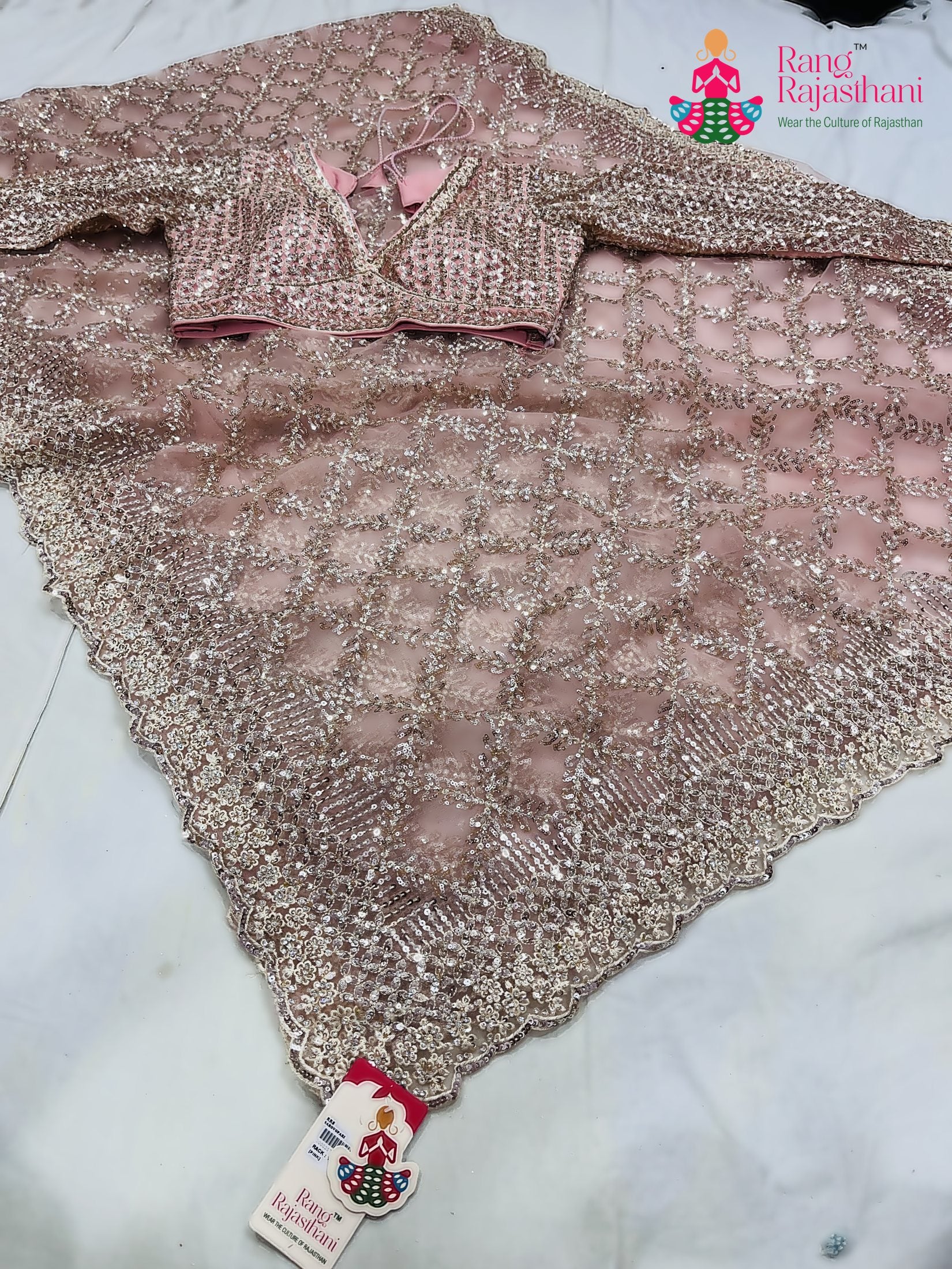 complete look of pink net sequin saree 