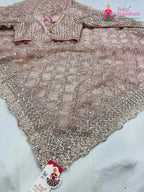 pallu detailing of pink net sequin saree 