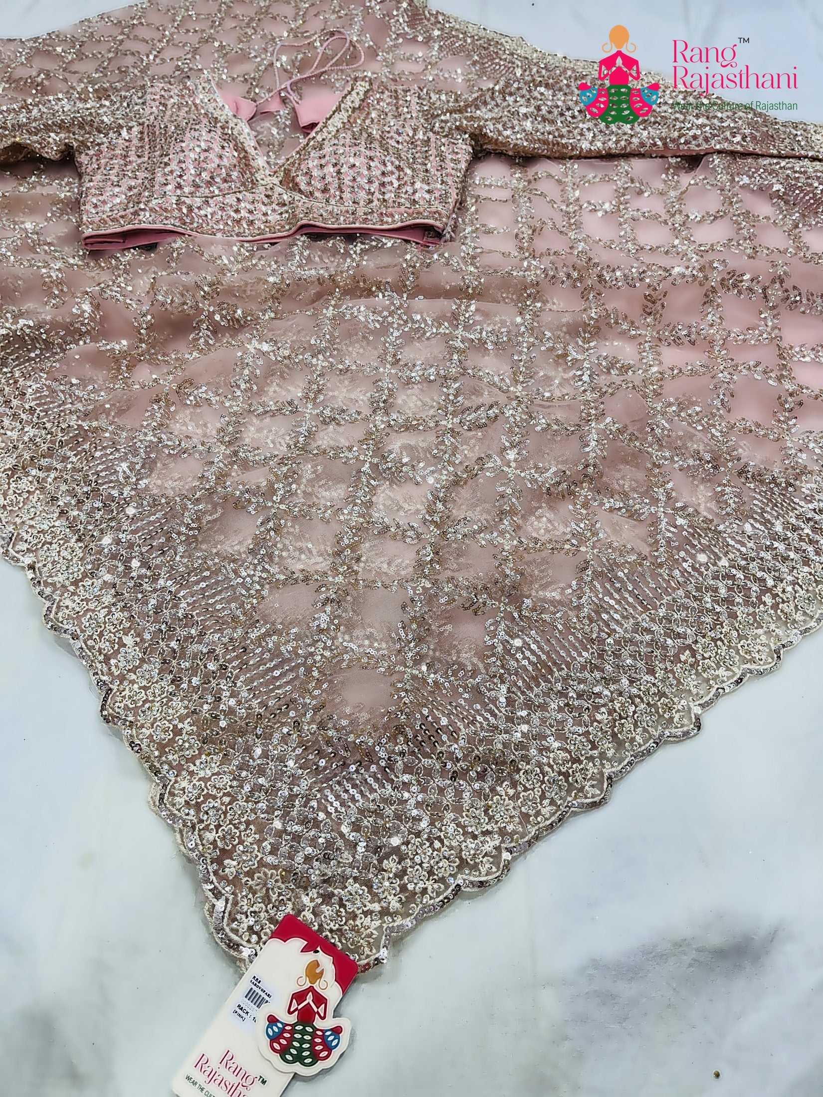 pallu detailing of pink net sequin saree 