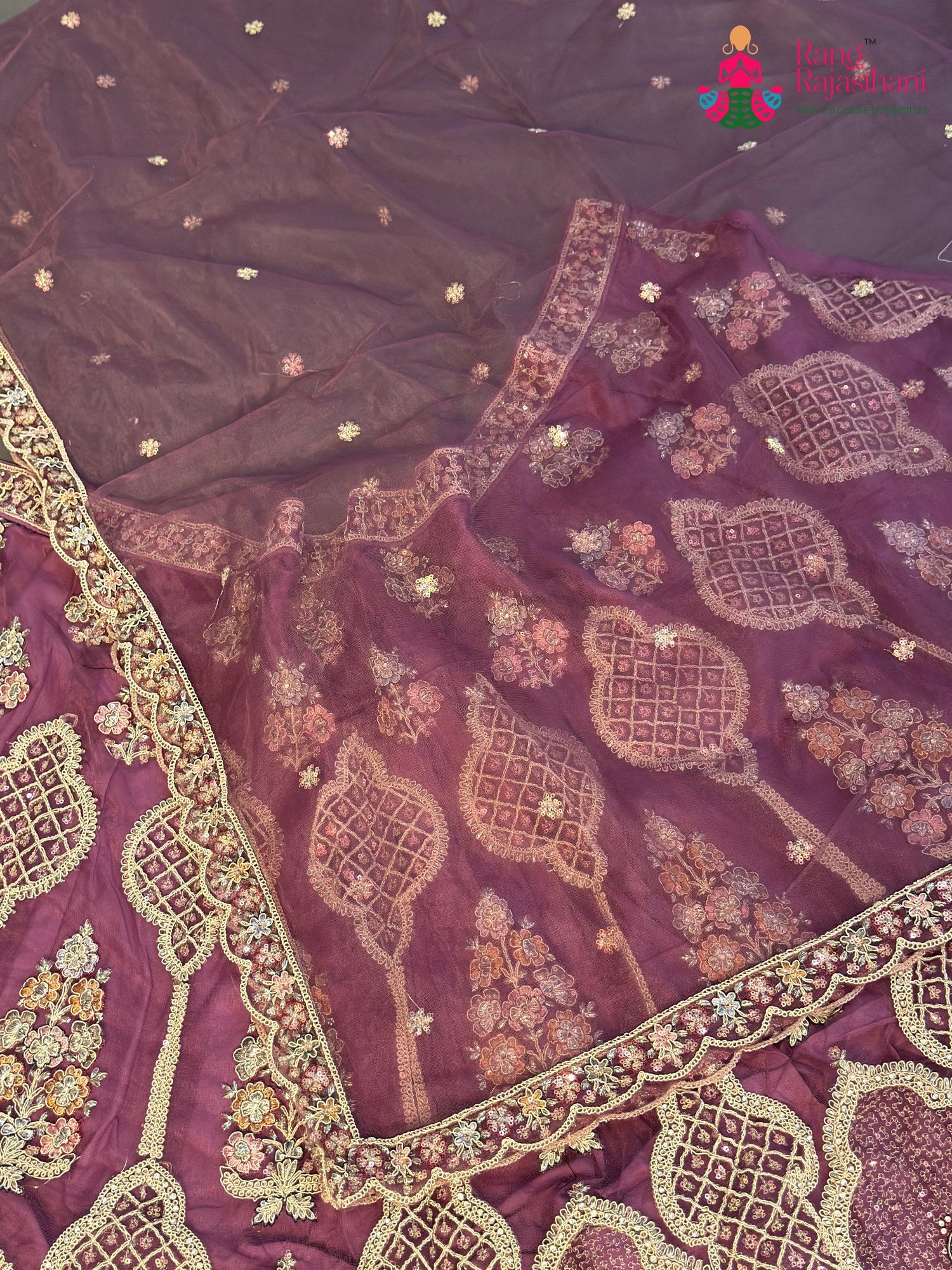 lehenga flare detailing of pink net zari embroidery saree