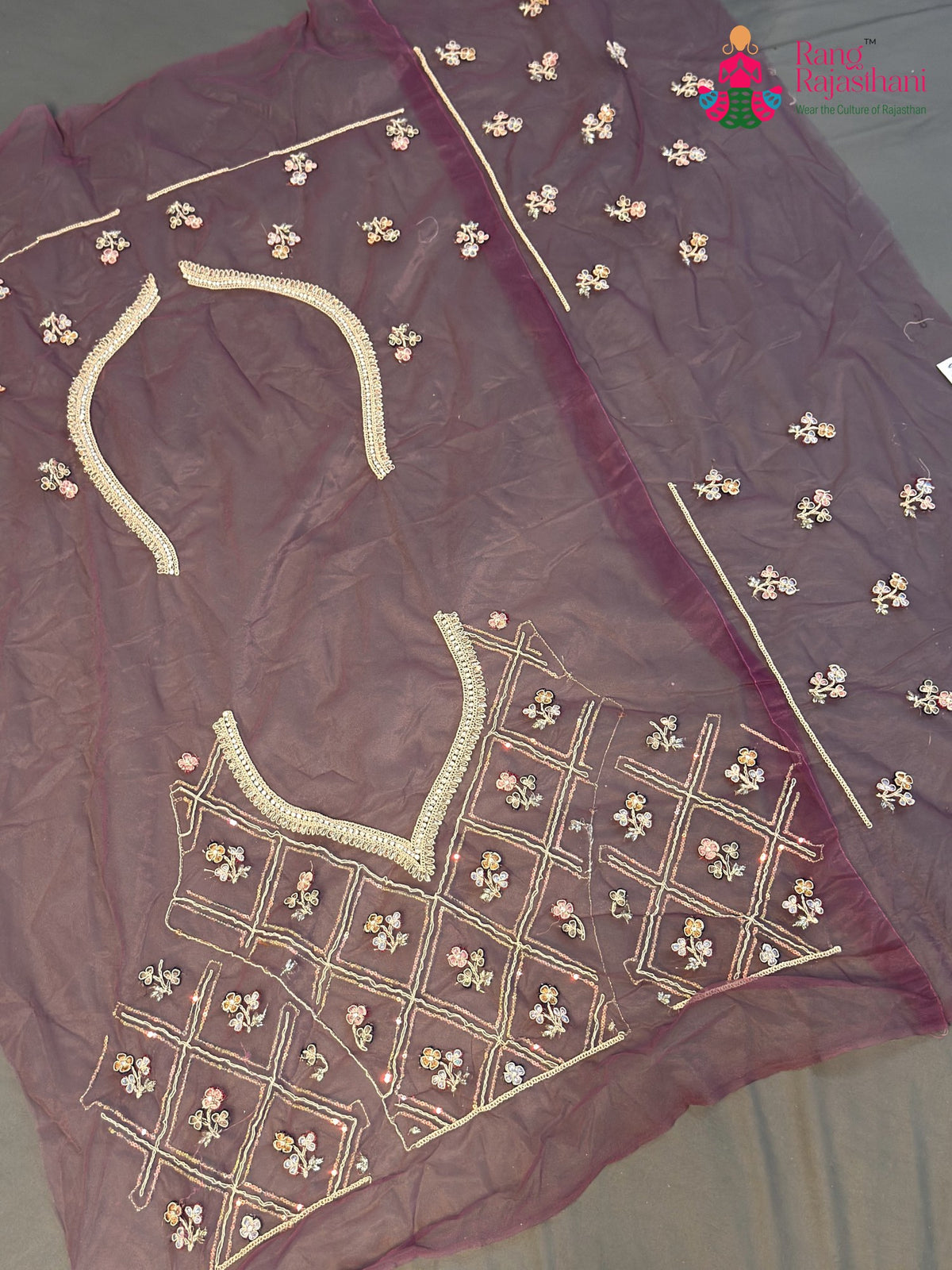 chunni detail of pink net zari embroidery saree