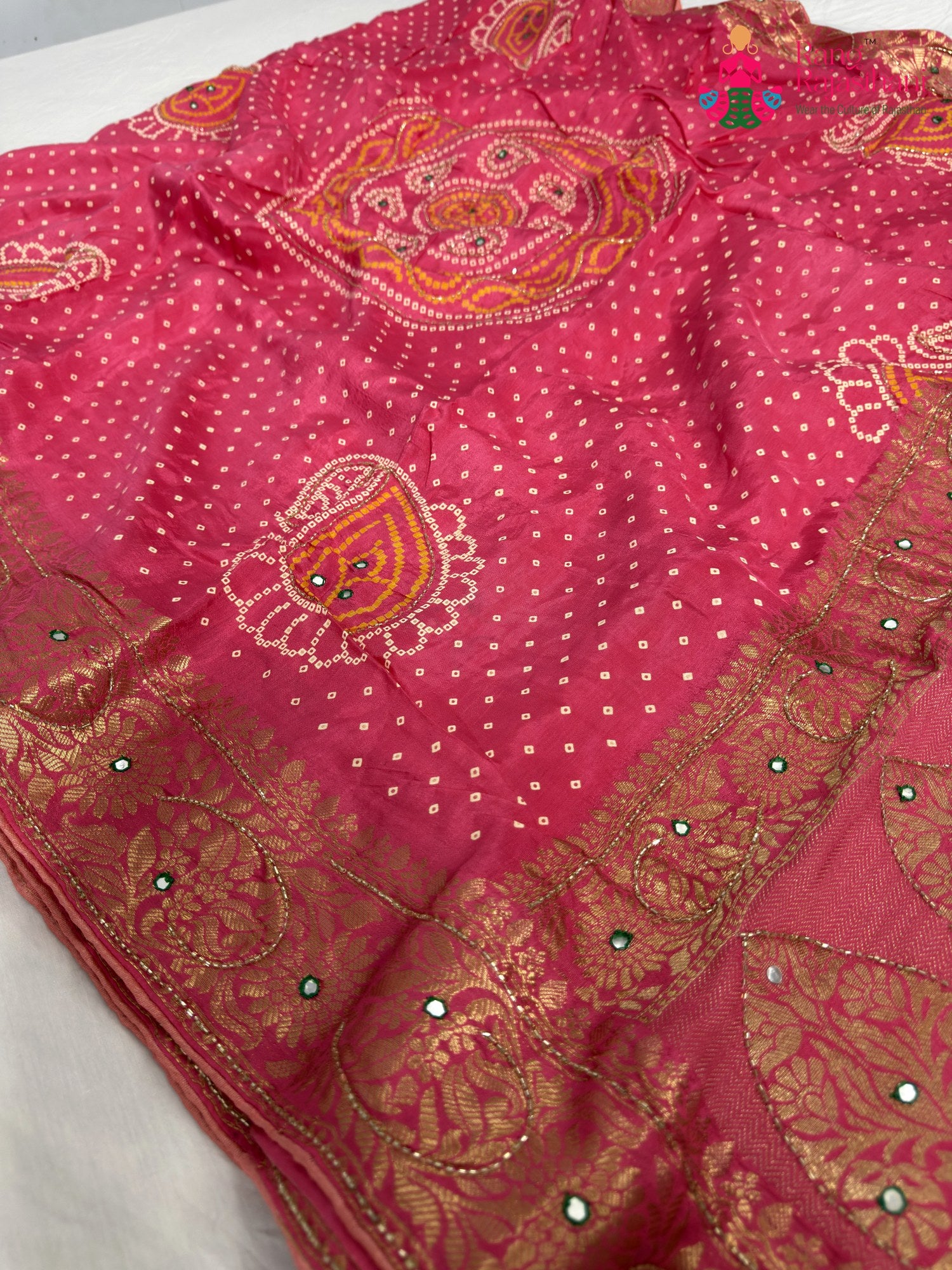 pallu detailing of pink pure russian silk bandhani saree