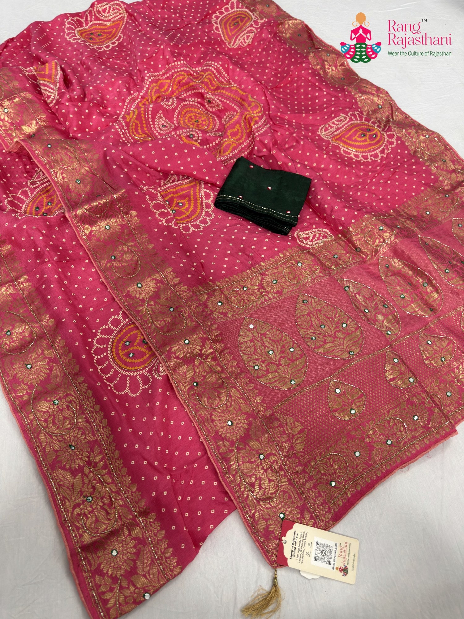 border detailing of pink pure russian silk bandhani saree