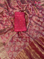 close up detailing of pink pure tissue silk banarasi zari weave saree