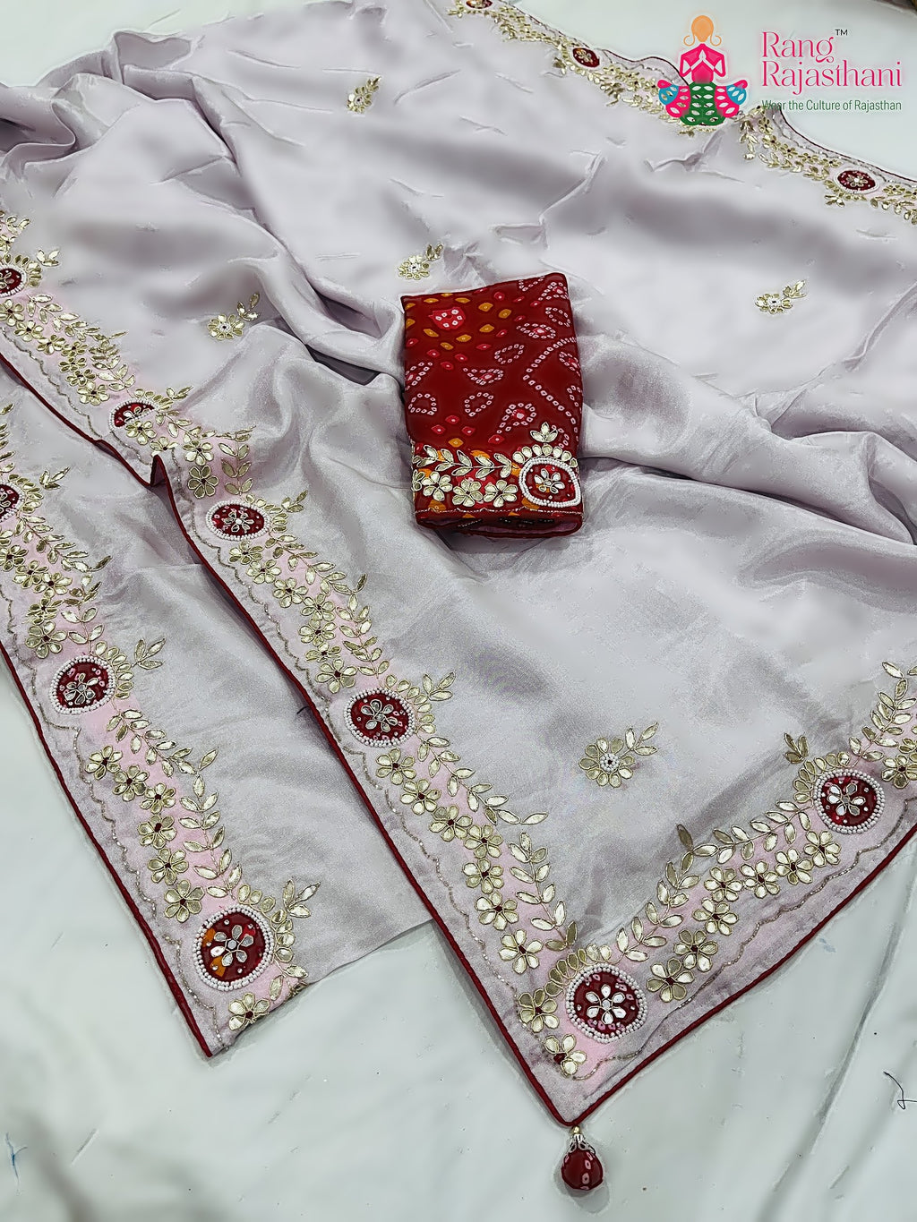 fabric texture of pink pure tissue silk gota patti saree 