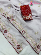 border detailing of pink pure tissue silk gota patti saree 