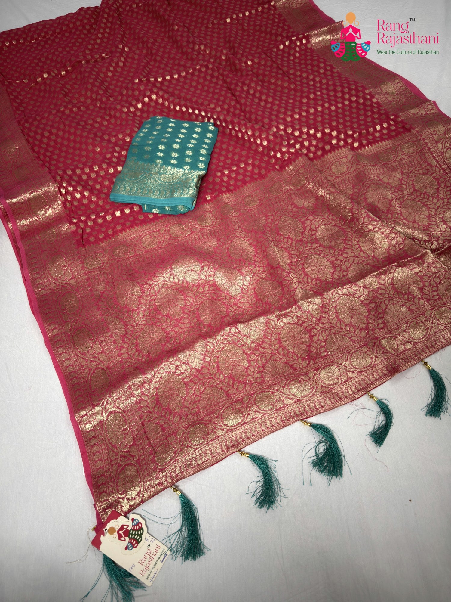 pallu detailing of pink soft georgette banarasi zari weave saree