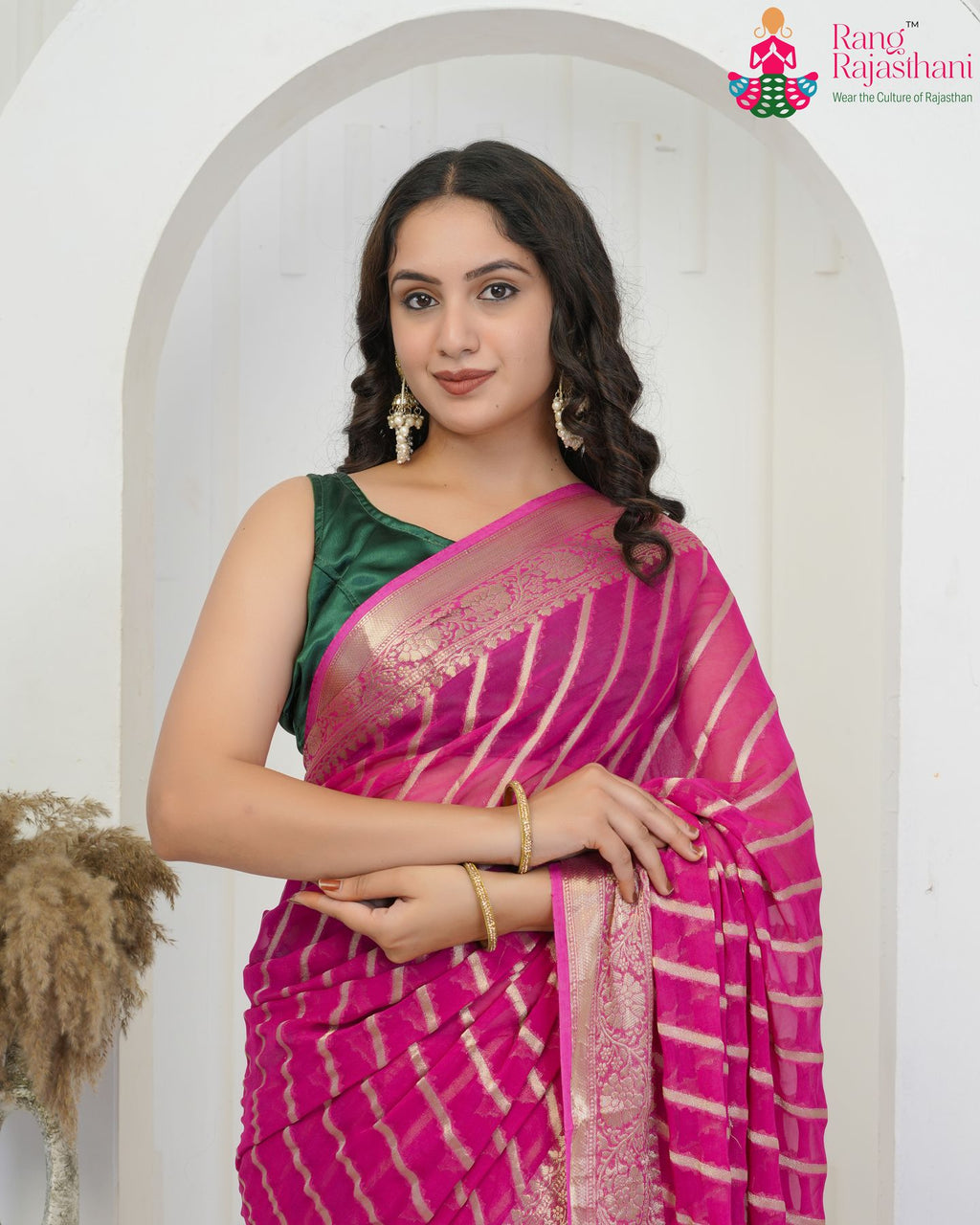 border detailing of pink soft georgette banarasi zari weave saree