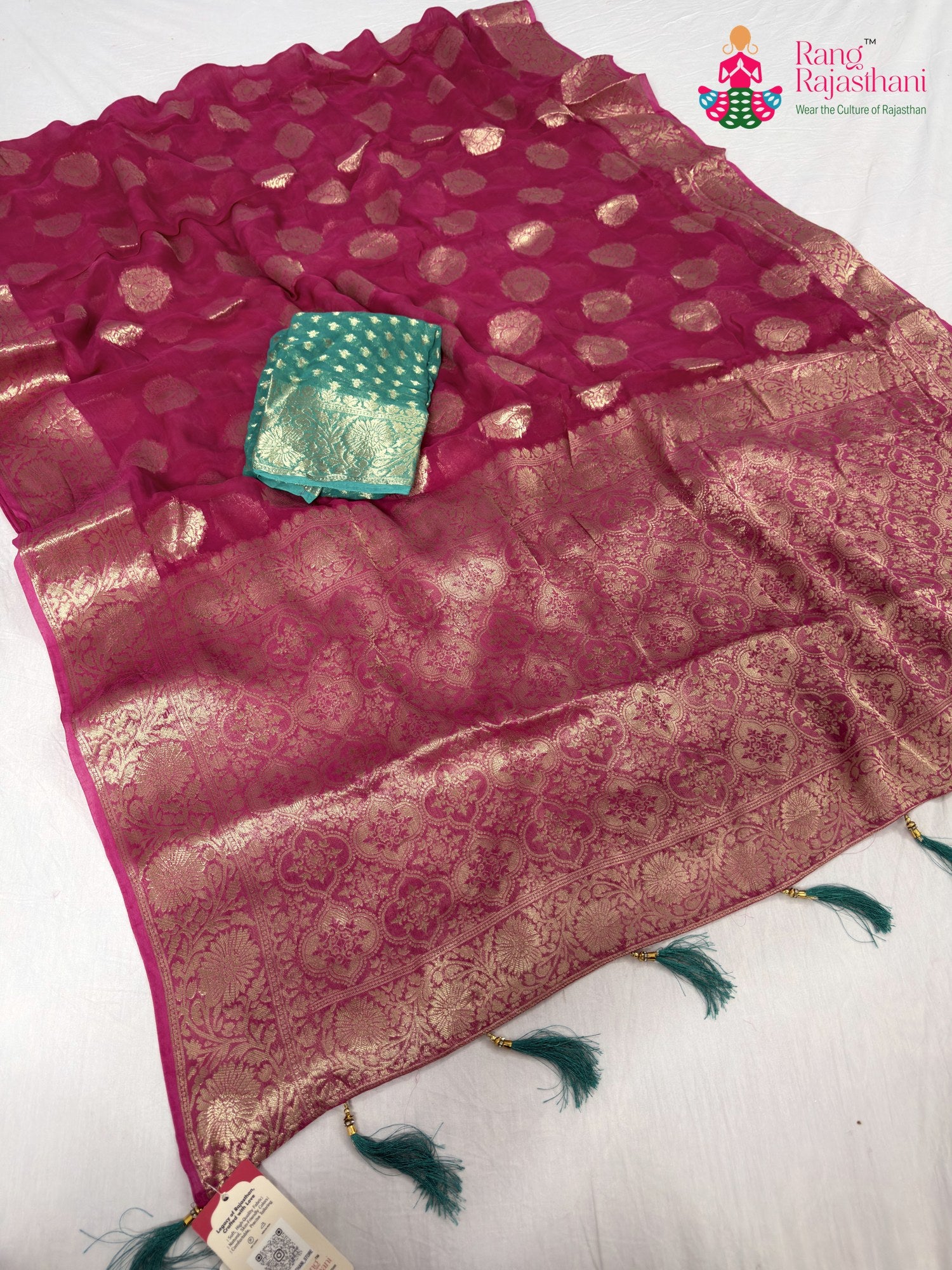 close up detailing of pink soft georgette banarasi zari weave saree