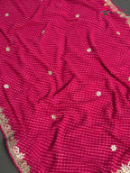 pallu detailing of pink synthetic gota patti leheriya saree