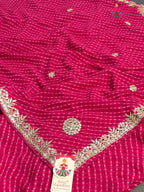 border detail of pink synthetic gota patti leheriya saree