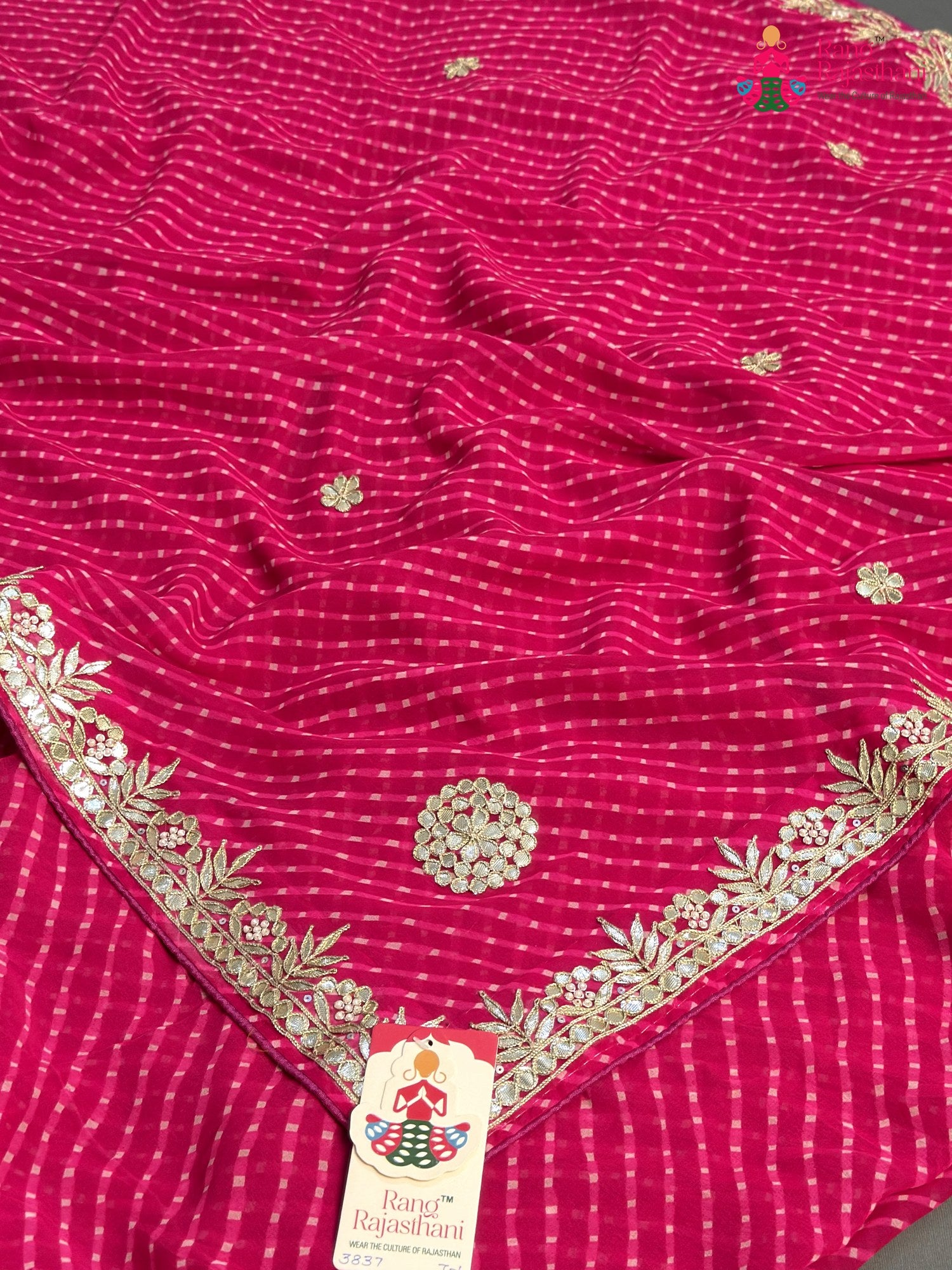 border detail of pink synthetic gota patti leheriya saree