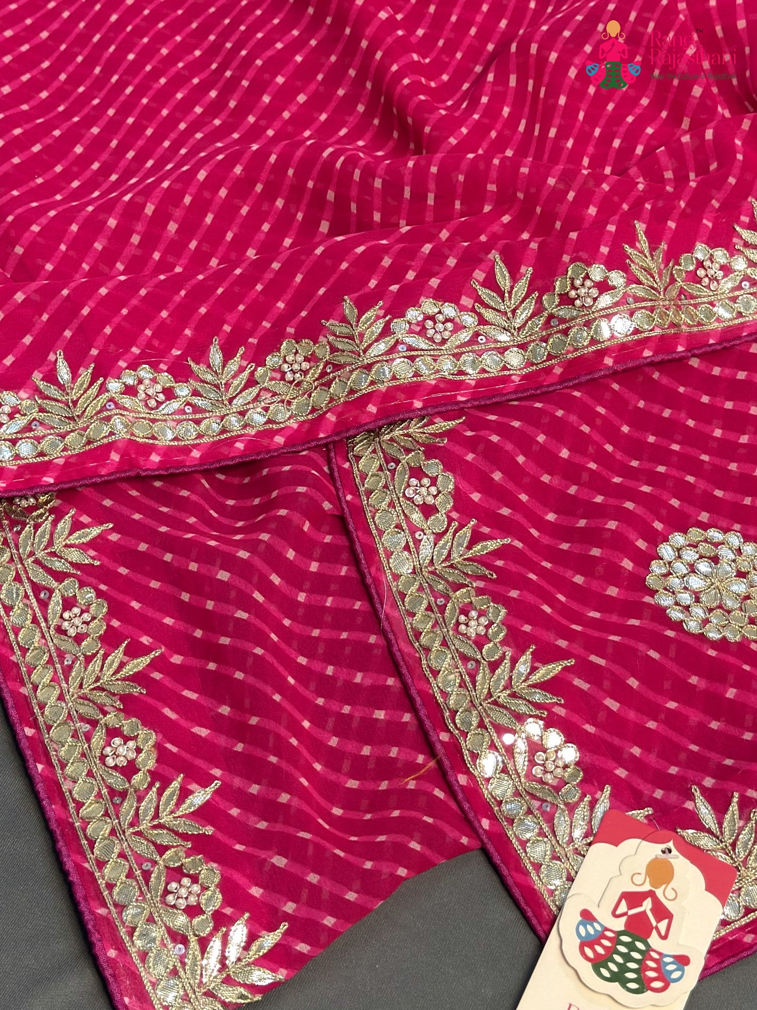 design pattern of pink synthetic gota patti leheriya saree