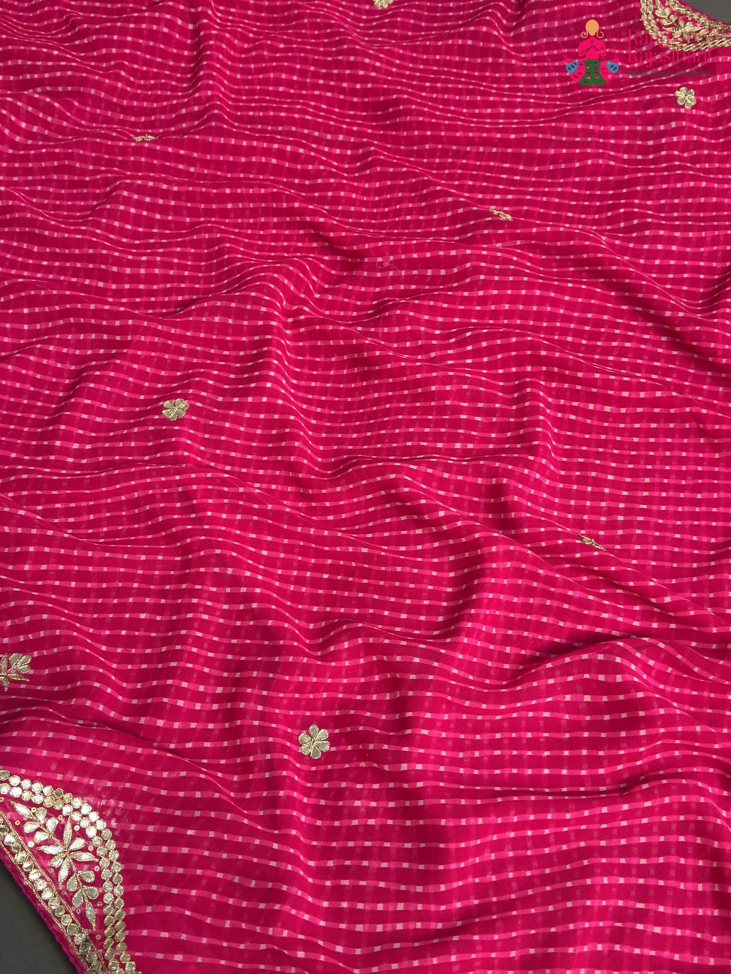 pallu detailing of pink synthetic gota patti leheriya saree