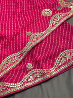 design pattern of pink synthetic gota patti leheriya saree