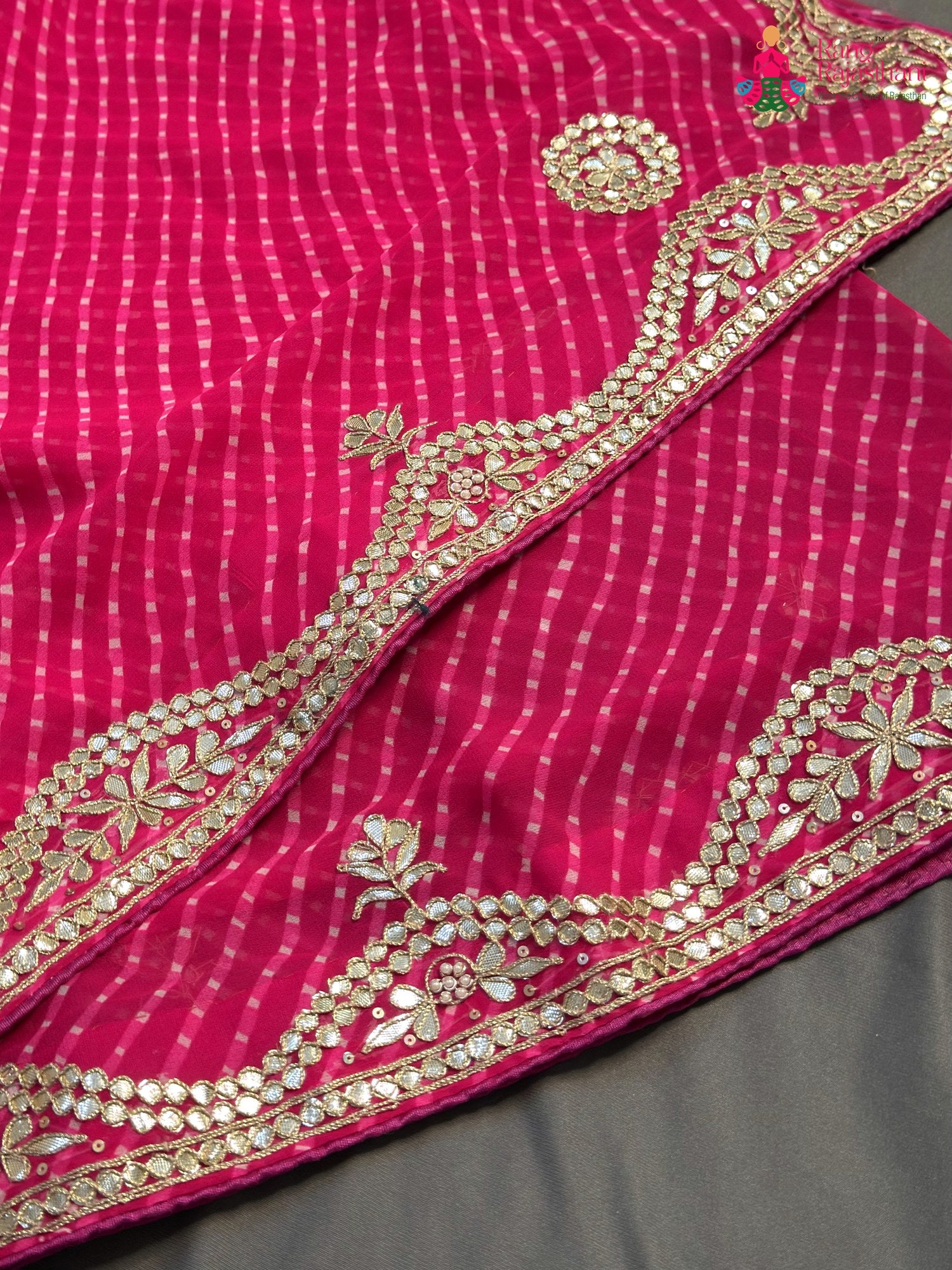 design pattern of pink synthetic gota patti leheriya saree