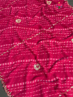pallu detailing of pink synthetic gota patti leheriya saree