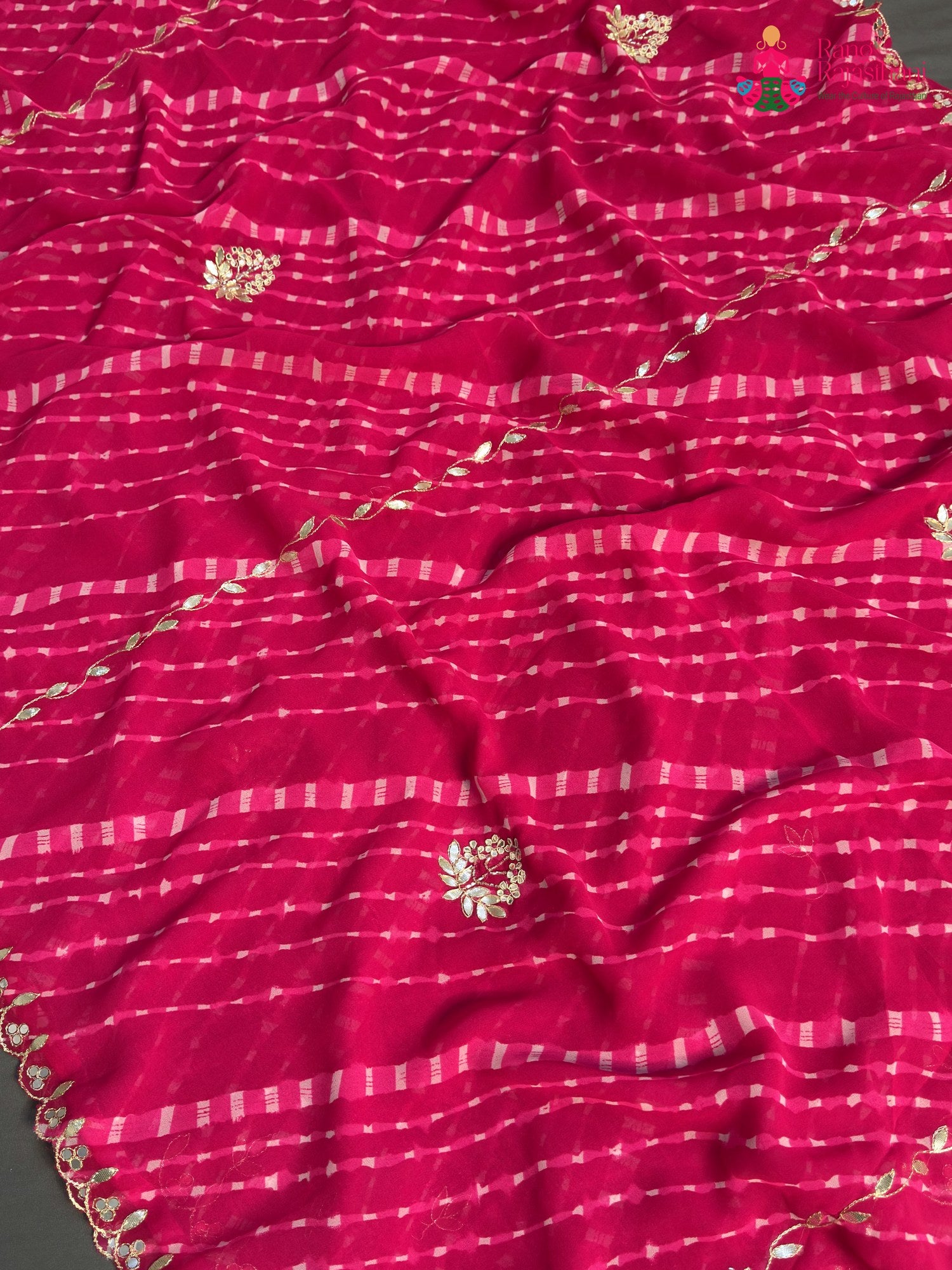 pallu detailing of pink synthetic gota patti leheriya saree