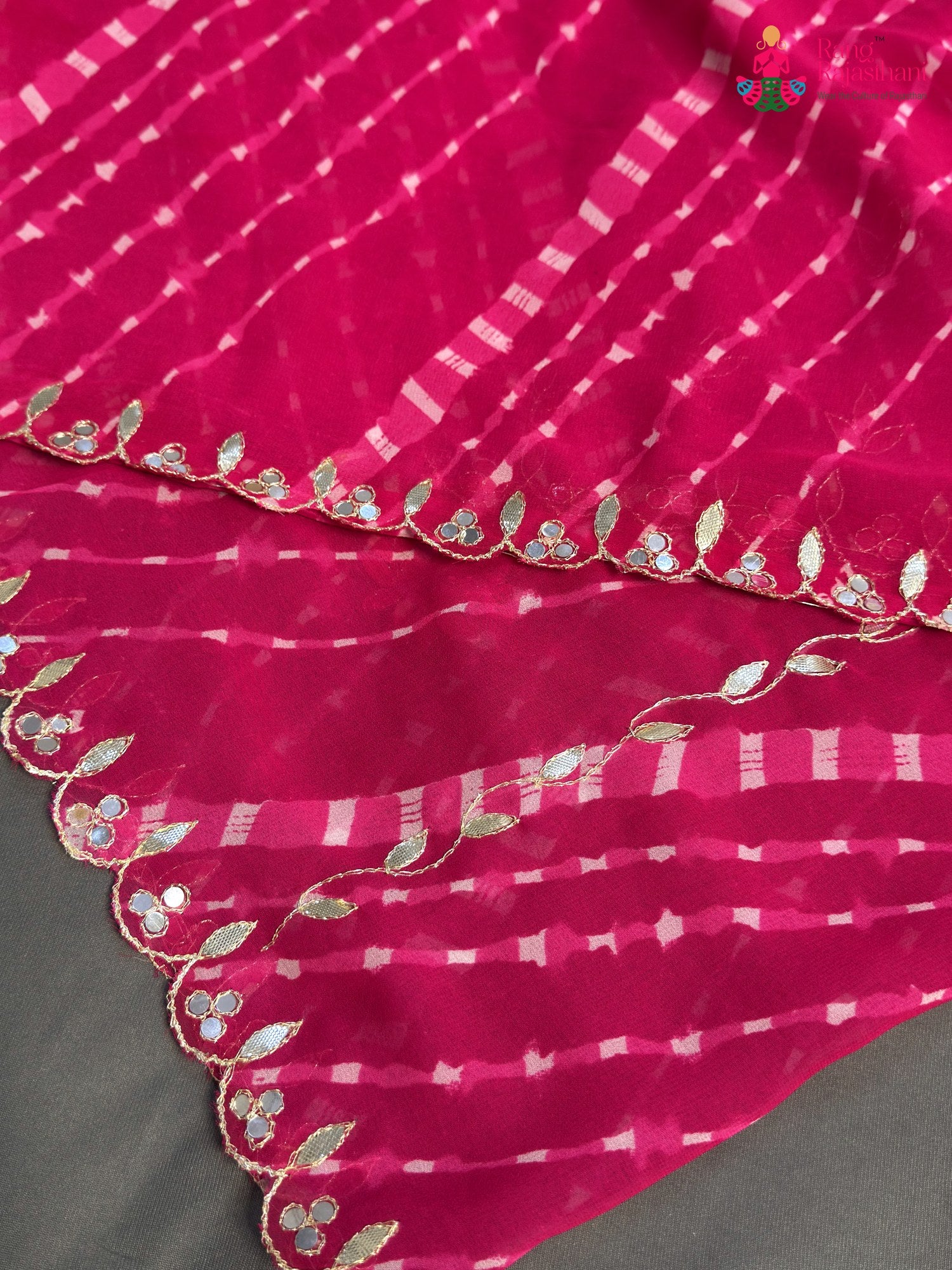 design pattern of pink synthetic gota patti leheriya saree
