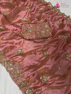 close up detailing of pink synthetic hand embellishment saree
