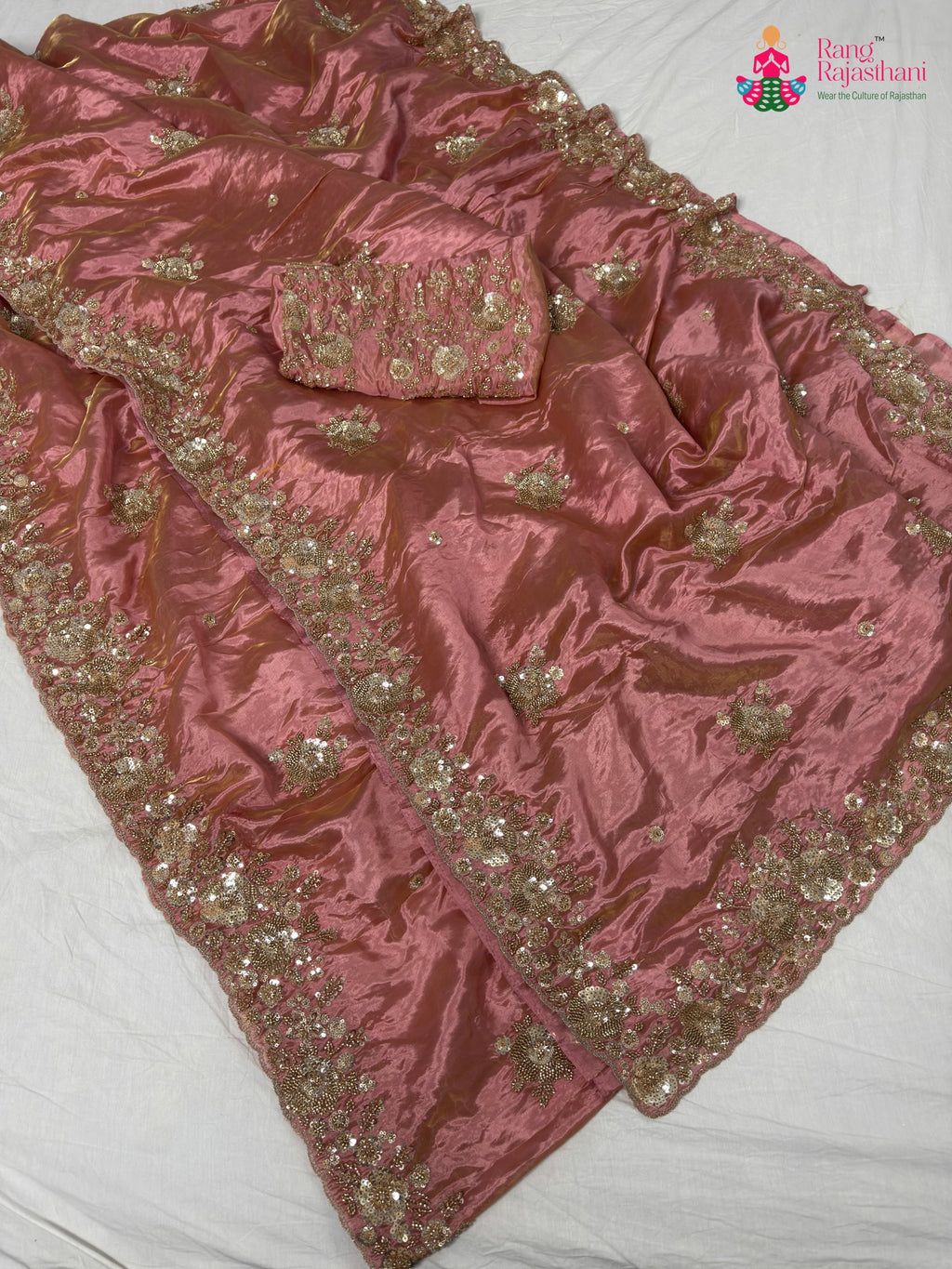 complete look of pink synthetic hand embellishment saree