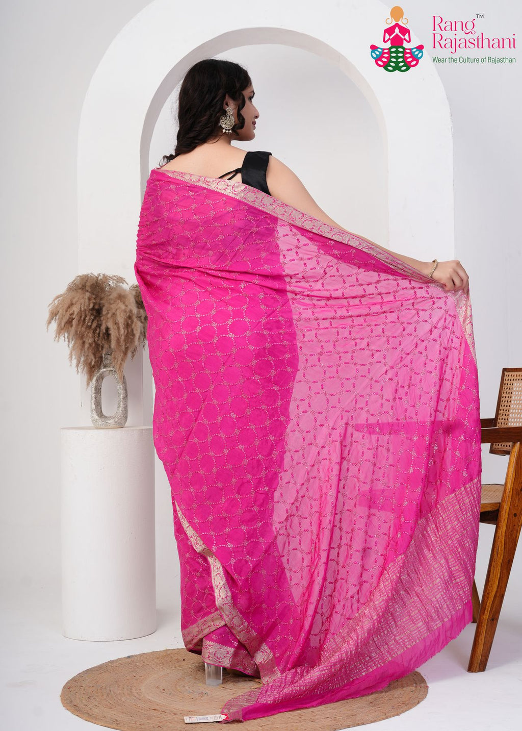 gajri chinnon saree with sequence work for reception ceremony back view