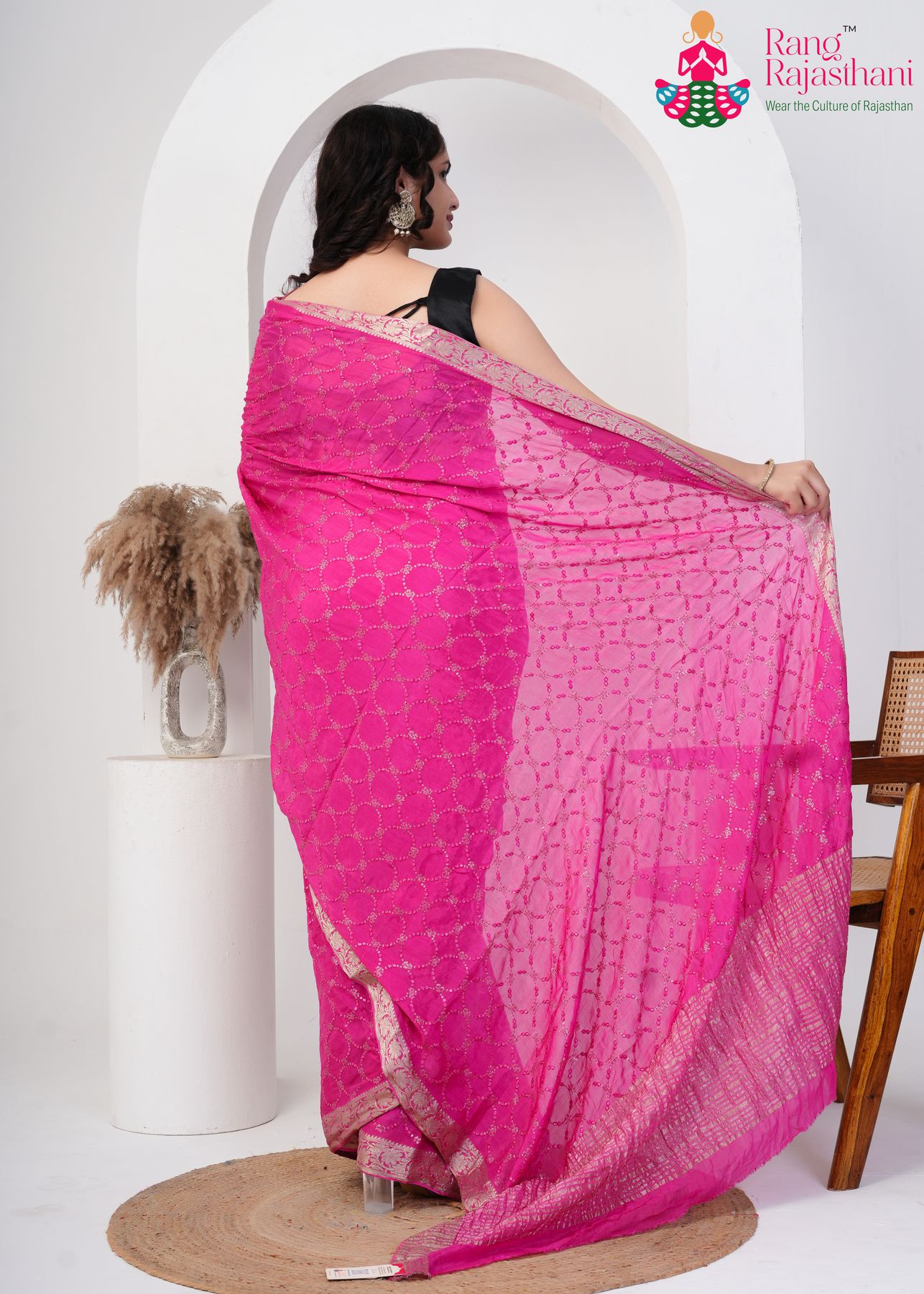 gajri chinnon saree with sequence work for reception ceremony back view