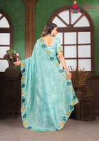 close up detailing of premium aqua fabric saree 
