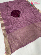 border detailing of premium lavender fabric saree