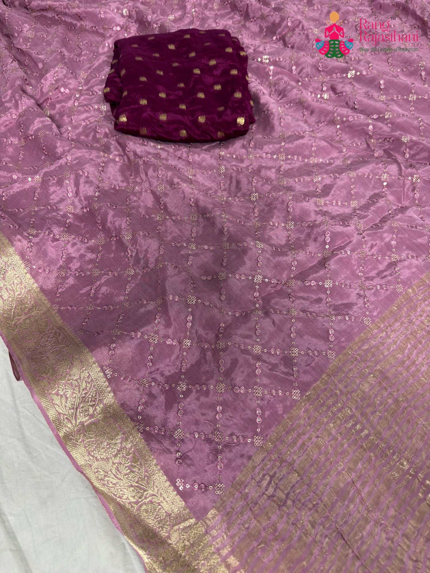 fabric texture of premium lavender fabric saree