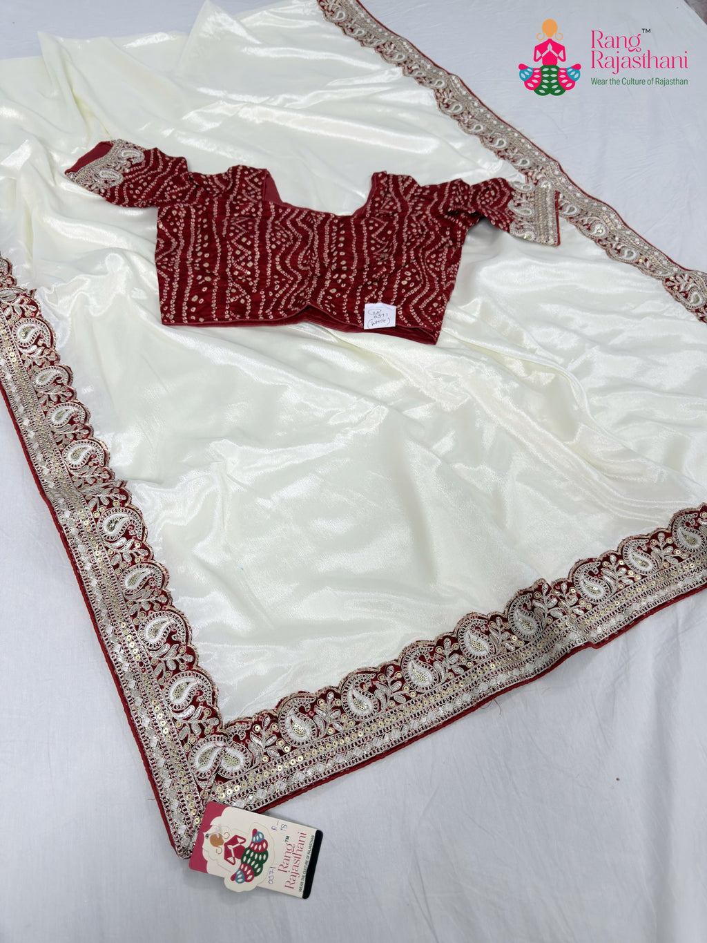 border detailing of premium white fabric saree