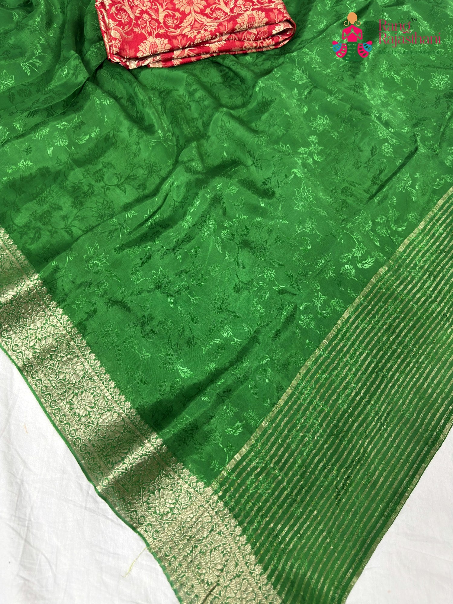 fabric texture of pure green print fabric saree