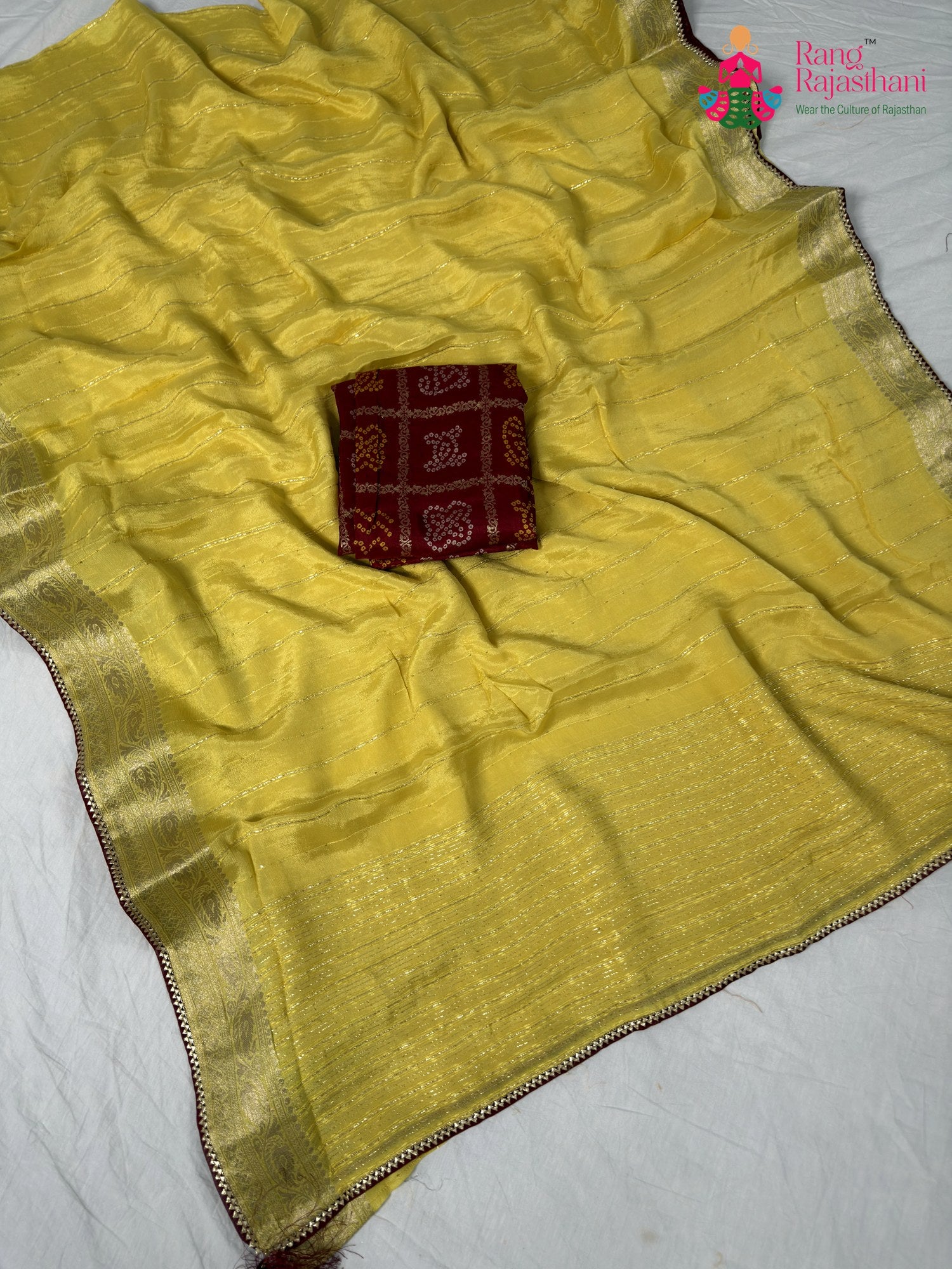 border detailing of pure yellow chinnon saree