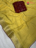fabric texture of pure yellow chinnon saree