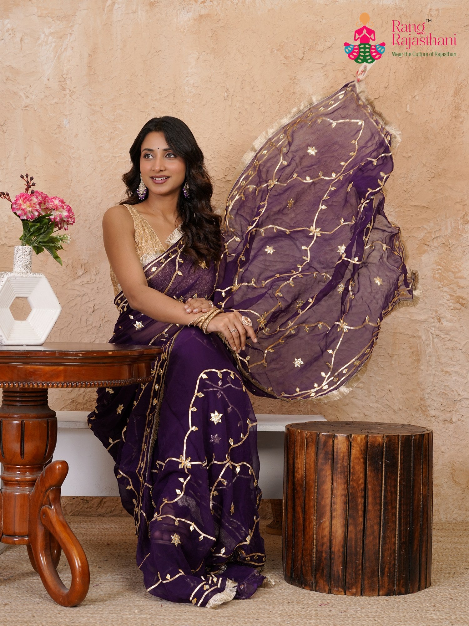 pallu detailing of purple chiffon gota patti saree