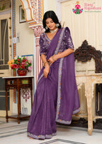 close up detailing of purple fabric saree 