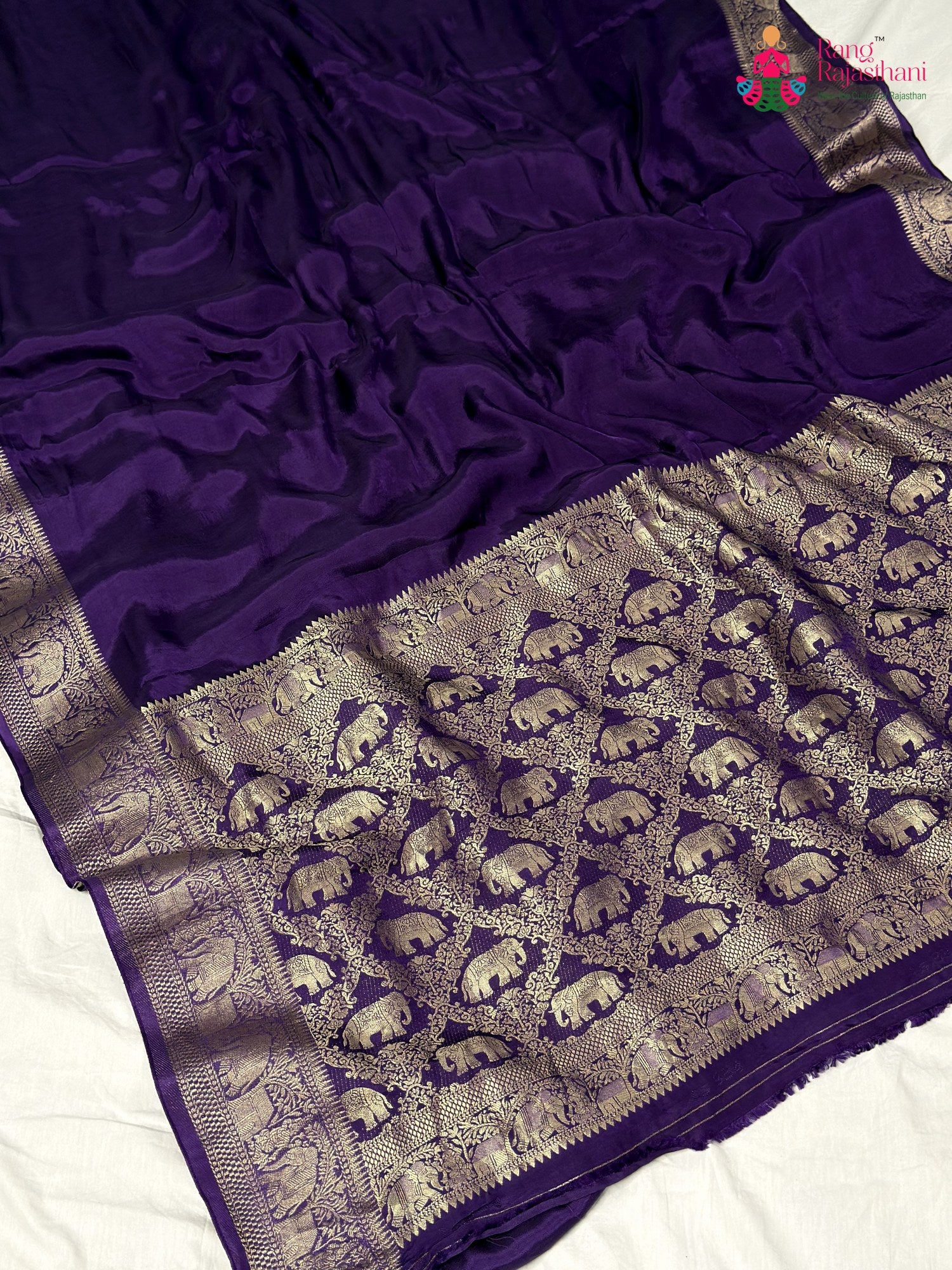 pallu detailing of purple modal banarasi zari weave saree