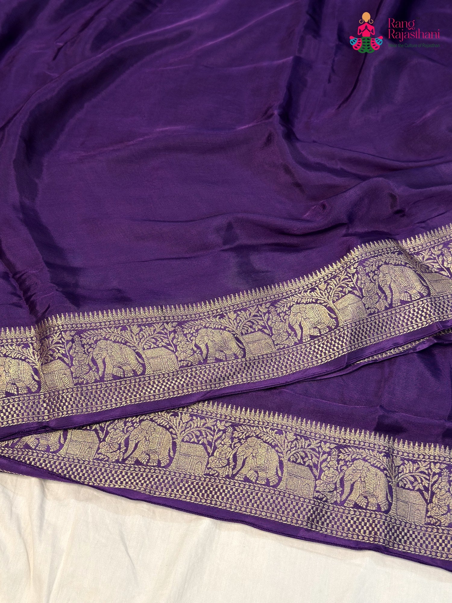 border detail of purple modal banarasi zari weave saree