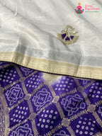 close up view of purple pure ho silk gharchola saree