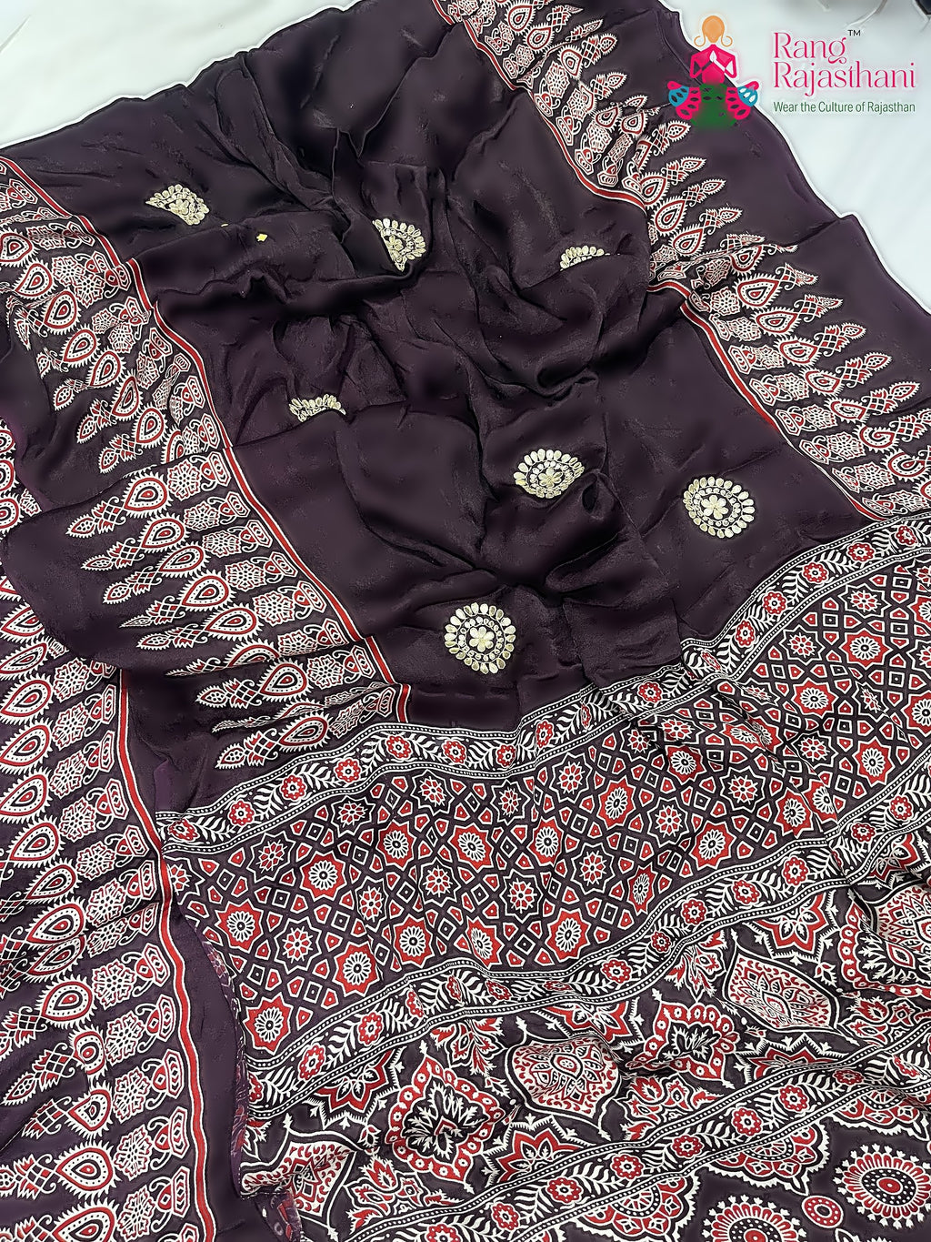 pallu detailing of purple pure modal silk ajrakh print saree 