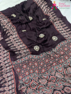 pallu detailing of purple pure modal silk ajrakh print saree 