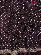 fabric texture of purple pure modal silk ajarakh print saree