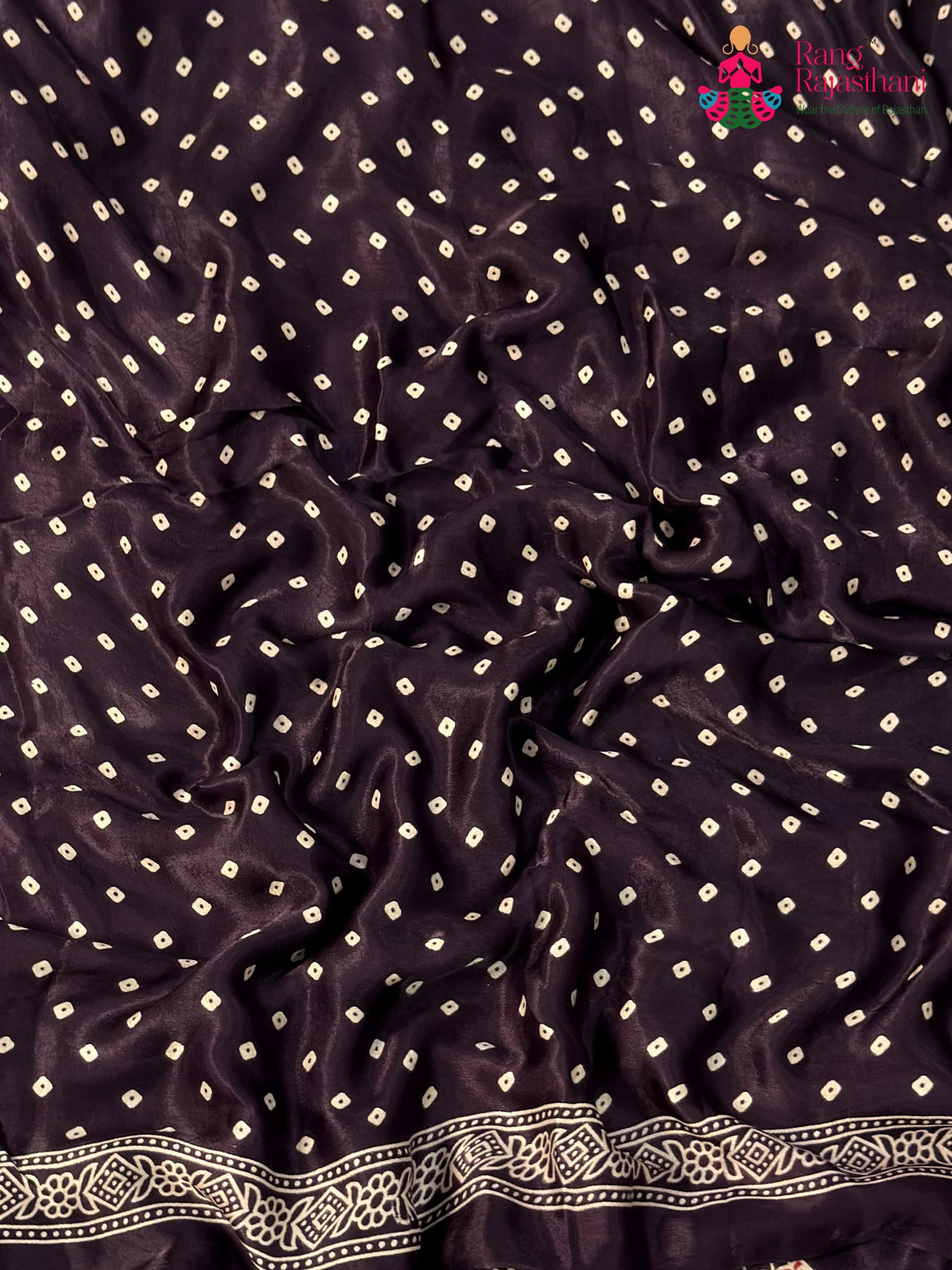 fabric texture of purple pure modal silk ajarakh print saree