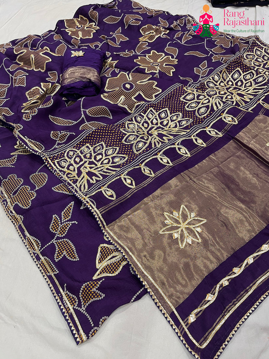 close up detailing of purple pure Russian silk bandhani saree 