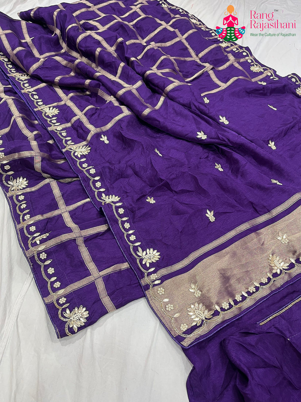pallu detailing of purple pure Russian silk gota patti saree 