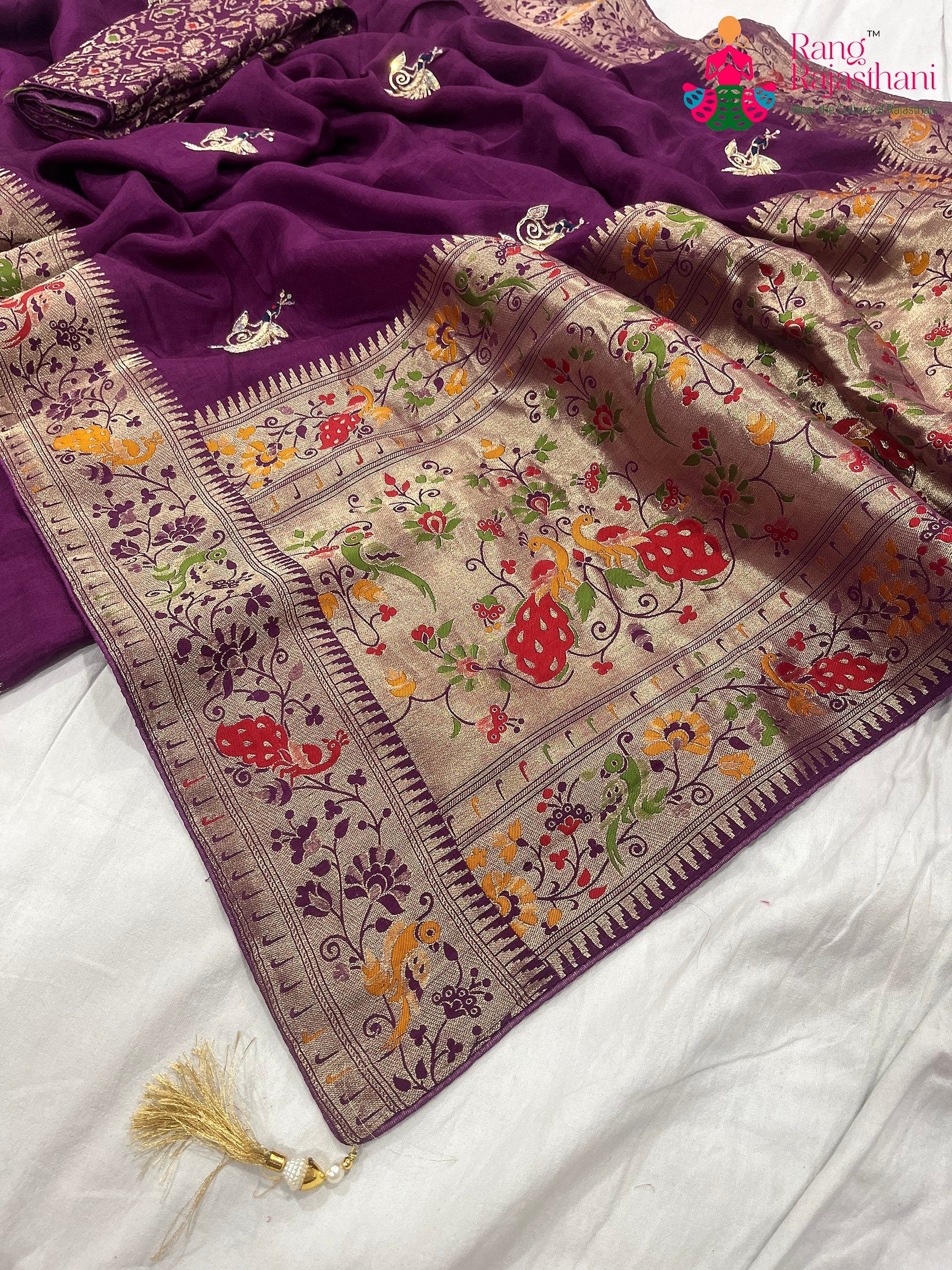pallu detailing of purple pure Russian silk hand saree 